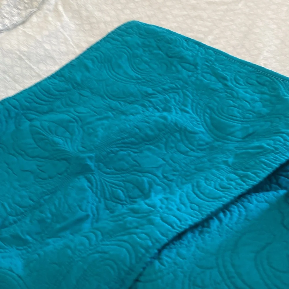 In excellent condition size Queen quilt.